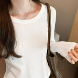 New Autumn And Winter T-Shirt With A Round Collar And Long Sleeves. A Short Ins Blouse With A Curved