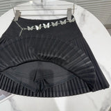 Solid Pleated Mini Skirt With Butterfly Chain- Outfit