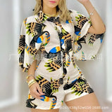 New Printed Lapel With A Row Of Buttons, Middle-Sleeved Shirt And One-Piece Trousers From
