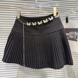 Solid Pleated Mini Skirt With Butterfly Chain- Outfit