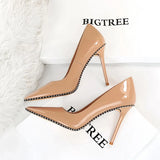 Zingj Sexy Super High Heel Retro Metal Chain Riveted Painted Leather Shallow Pointed High Heels Women's Singles