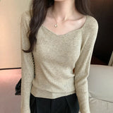 Woman's Clavicle Sweater Shows A Slim And Leaky Collarbone With A Square Collar In The Autumn And