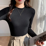 Women Wear A Long-Sleeved White T-Shirt With A Half-High Collar To Show A Thin Blouse In Autumn And