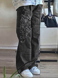 black cargo jeans with washed effect and heart