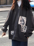 with sewn on graphics and zip