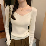 Woman's Clavicle Sweater Shows A Slim And Leaky Collarbone With A Square Collar In The Autumn And