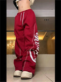 school baggy sweatpants with seams and logo