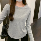 New Autumn And Winter T-Shirt With A Round Collar And Long Sleeves. A Short Ins Blouse With A Curved