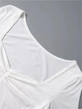 long-sleeved top with square neckline and