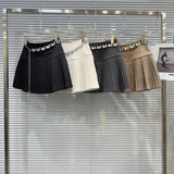 Solid Pleated Mini Skirt With Butterfly Chain- Outfit