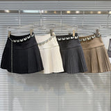 Solid Pleated Mini Skirt With Butterfly Chain- Outfit
