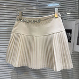 Solid Pleated Mini Skirt With Butterfly Chain- Outfit