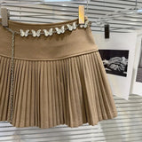 Solid Pleated Mini Skirt With Butterfly Chain- Outfit