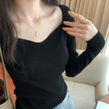 Woman's Clavicle Sweater Shows A Slim And Leaky Collarbone With A Square Collar In The Autumn And