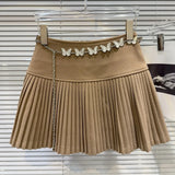Solid Pleated Mini Skirt With Butterfly Chain- Outfit
